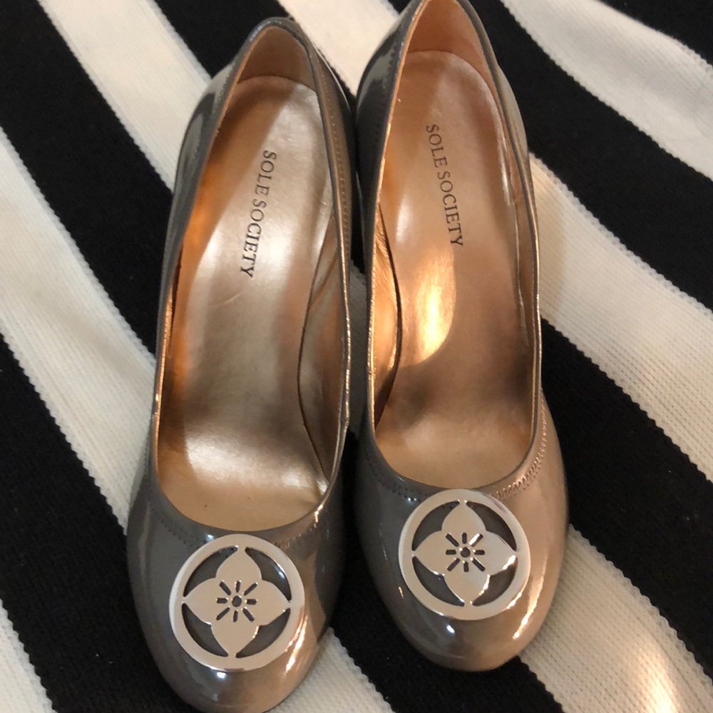 Dark gray shiny wedged pumps. Size 7.5